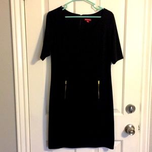 Black dress with gold zipper detail